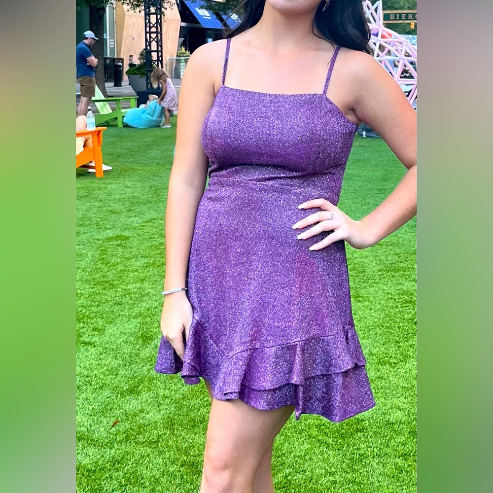 Purple sparkly short dress. Ties in bow on back.